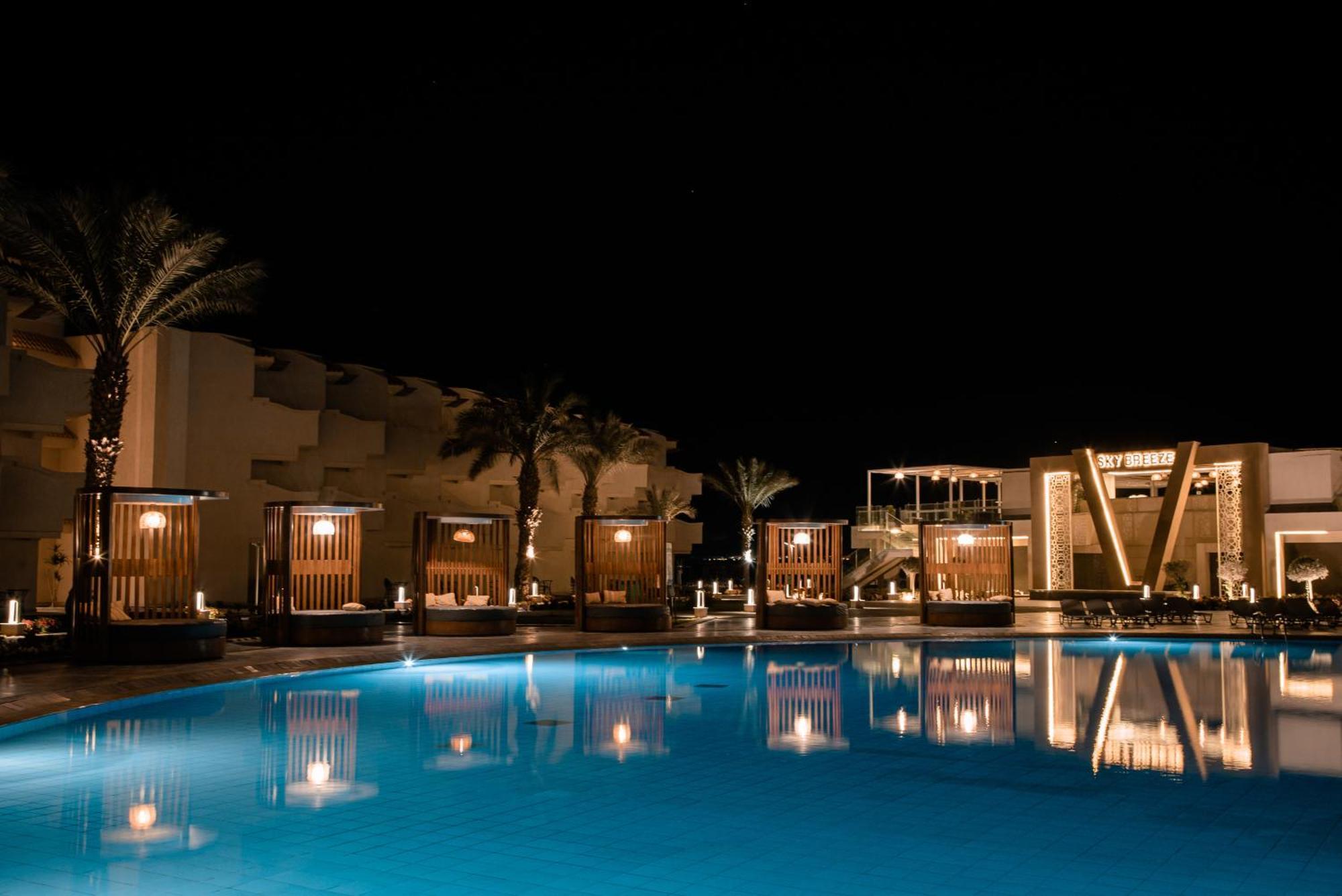 The V Luxury Resort Sahl Hasheesh Hurghada Exteriör bild The swimming pool at the resort