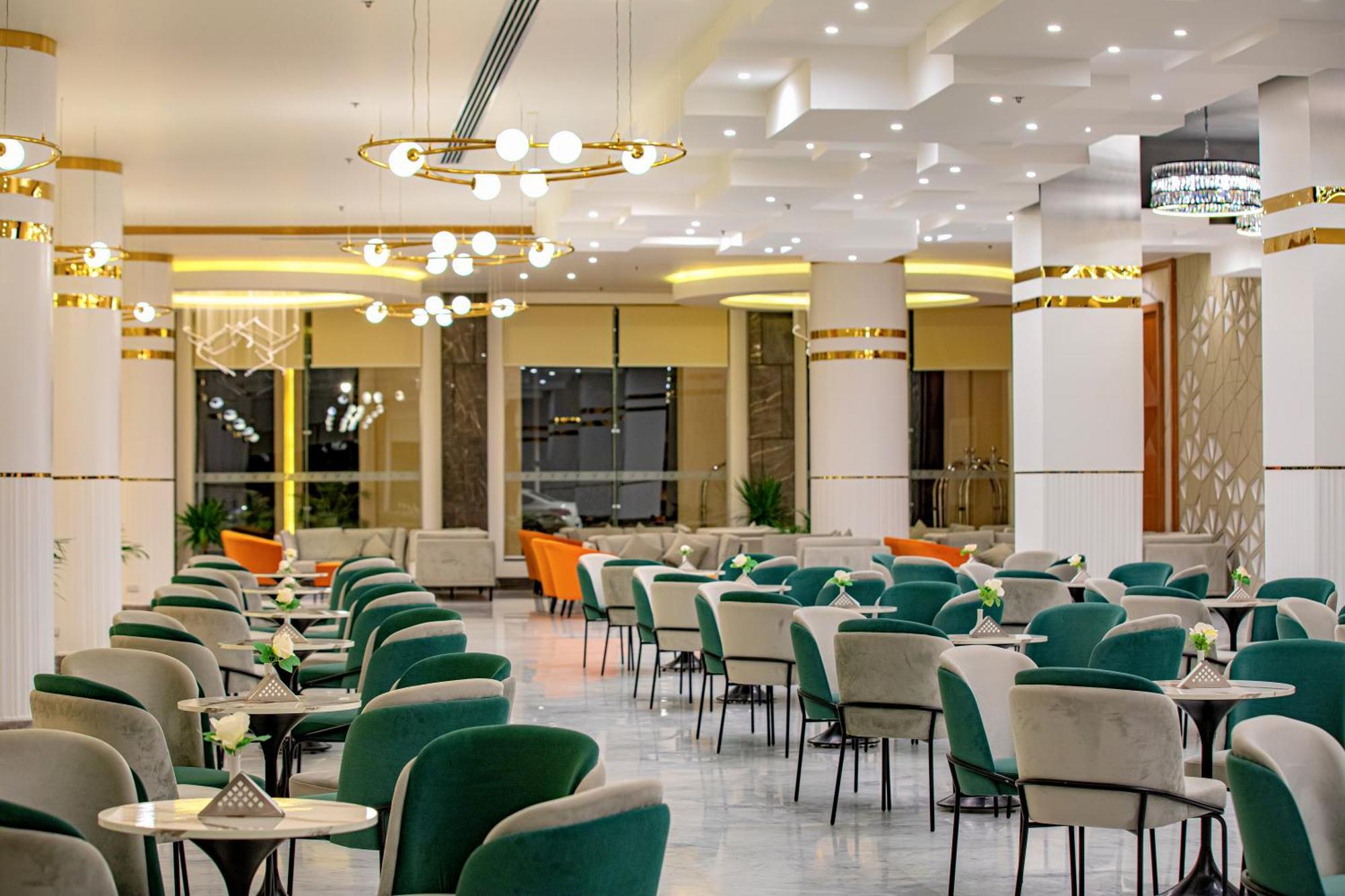 The V Luxury Resort Sahl Hasheesh Hurghada Exteriör bild The interior of the restaurant